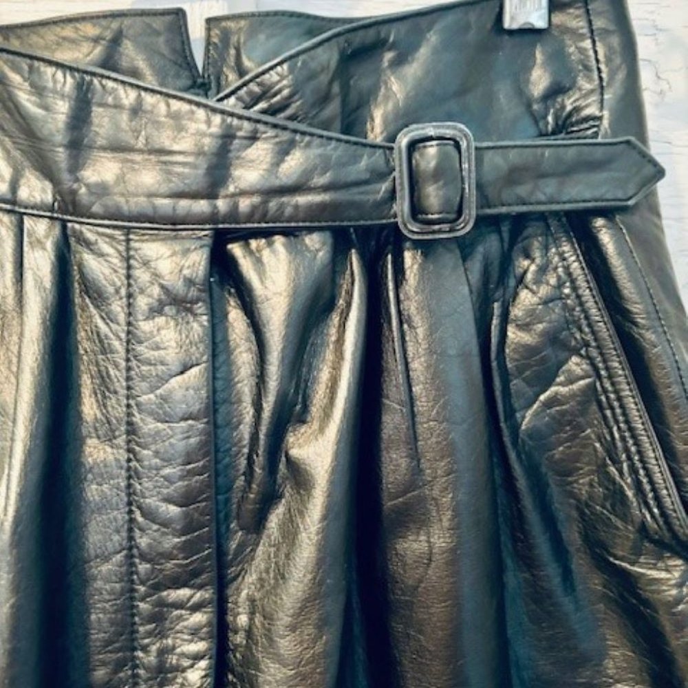 Vintage black leather high waist pants with buckle detail